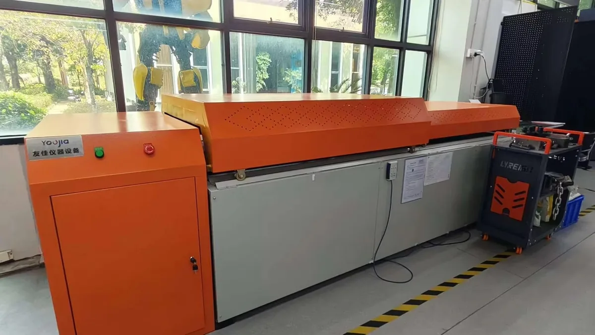 Large walk-in environmental chamber with a perforated air distribution hood in a test room