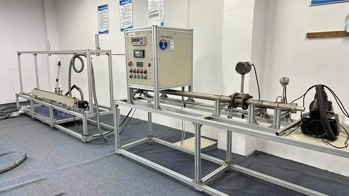Custom flow and pressure test bench with pipework, instrumentation and a control cabinet